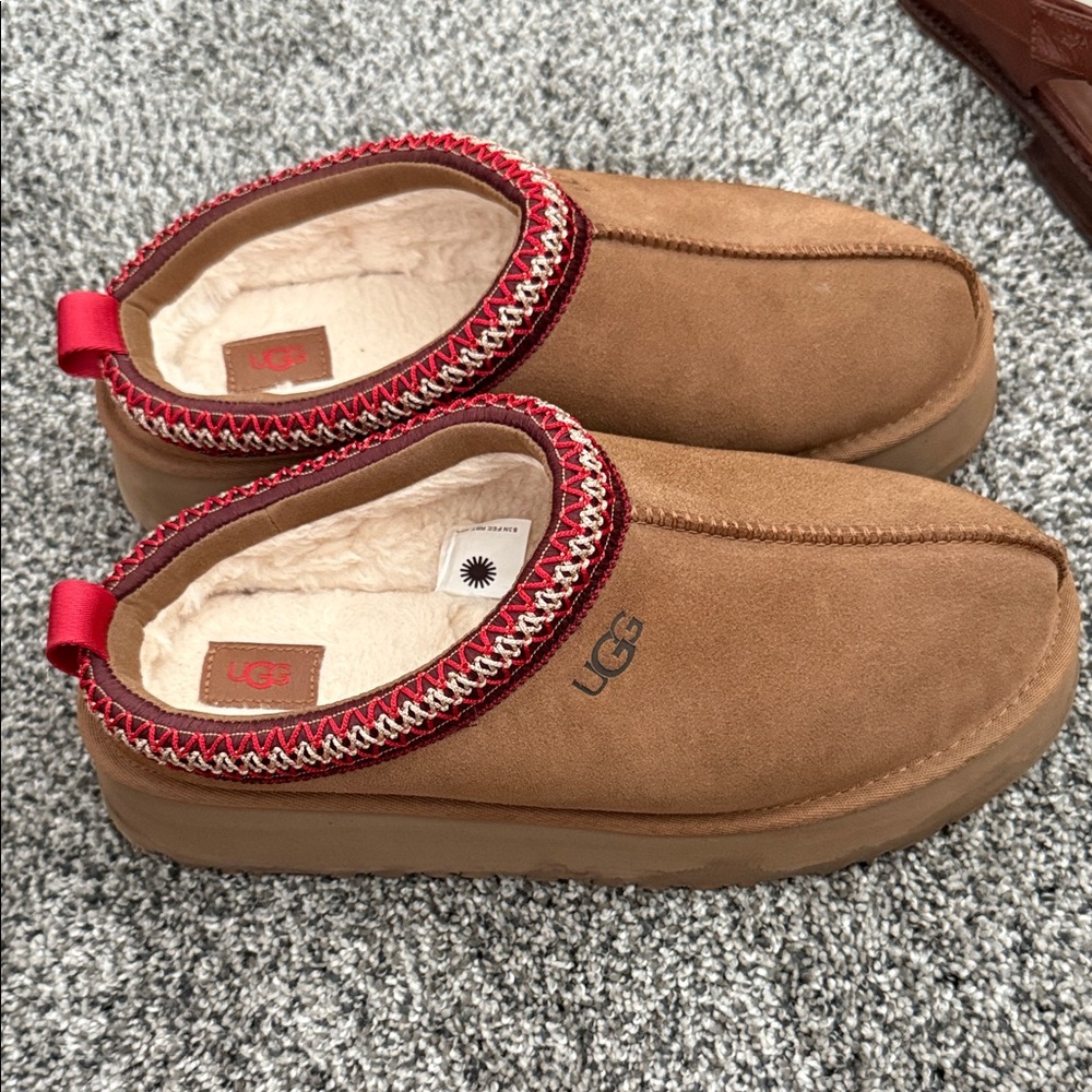 UGG Brown Slippers with Red Accents